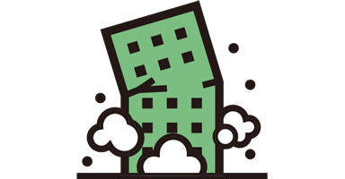 建物が倒れる